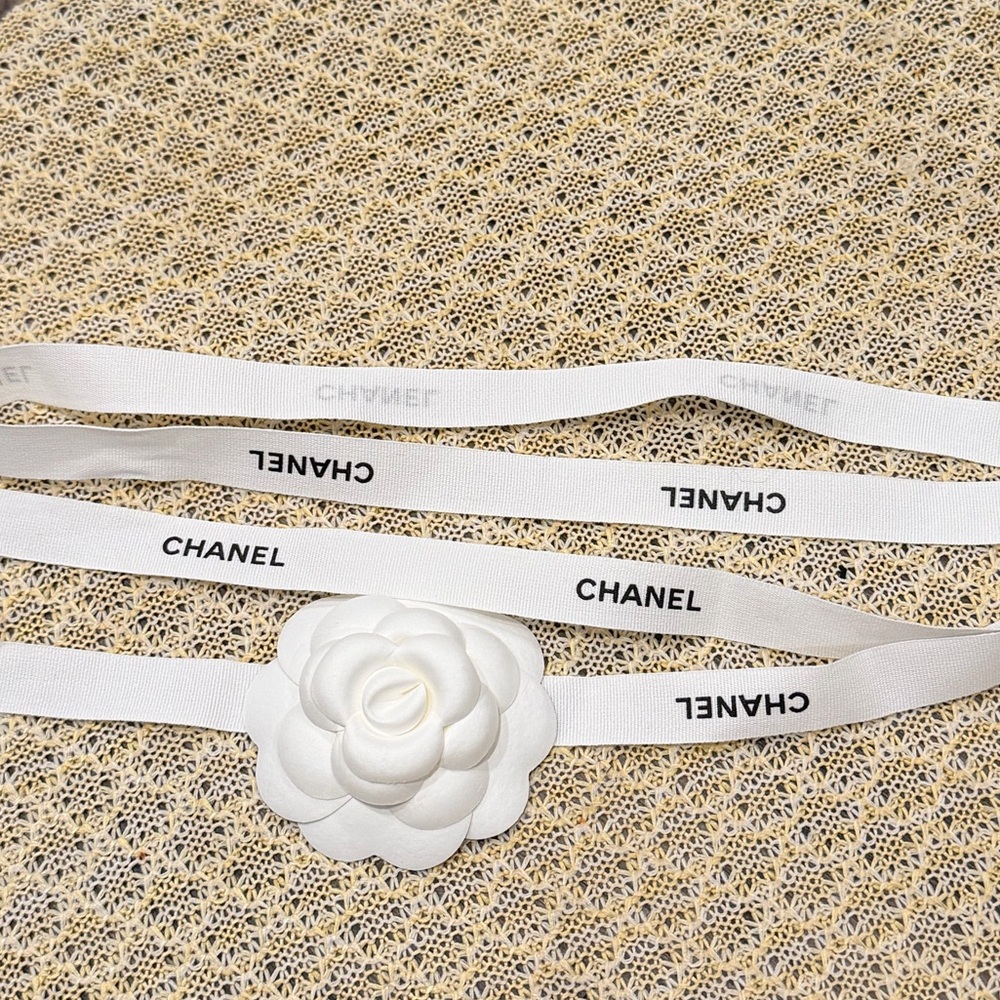 Authentic Chanel ribbon 48 in with flower